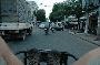 craig's feet riding through traffic in a cyclo in saigon